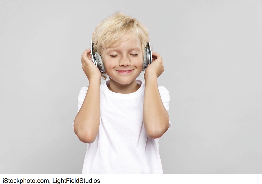 a boy listening to music